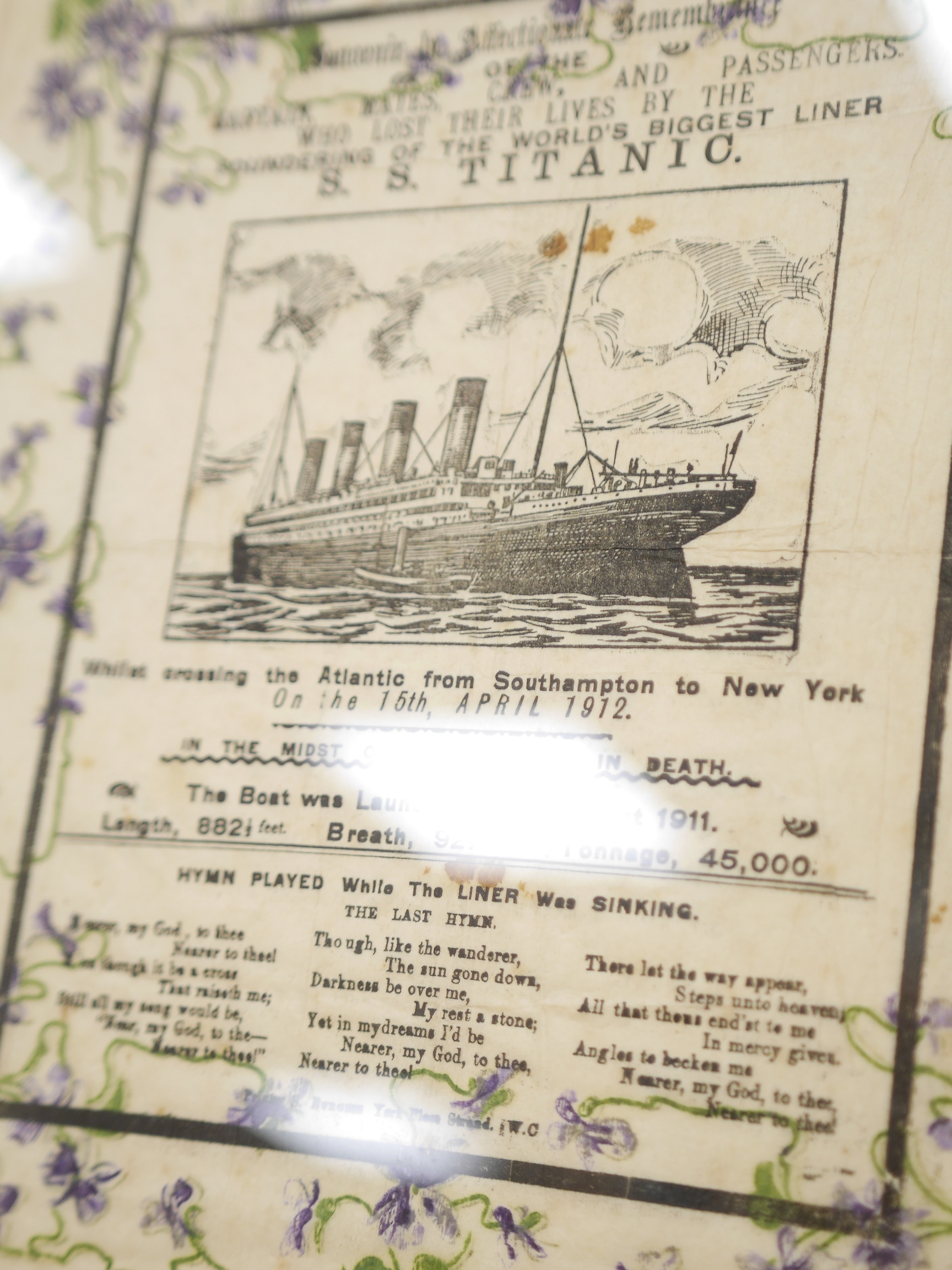 SS Titanic interest, a memorial mourning crepe paper print, 33 x 33cm, framed. Condition - fair